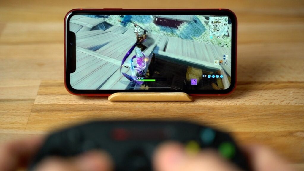 48283 94275 29561 47819 Playing Fortnite with controller on iPhone XR xl xl
